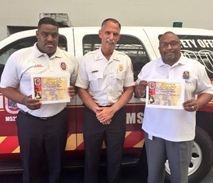 Darren Ware (left), Fire Chief Marc Bashoor and Lt. Col. Tyrone Wells.