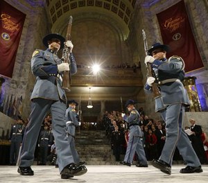 Members of a Washington State Patrol honor guard march in the Capitol rotunda during the Governor's Inaugural Ball, at the Capitol Wednesday, Jan. 11, 2017, in Olympia, Wash.