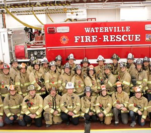 Waterville Fire-Rescue removed a photograph from its Facebook page after some accused one of the firefighters in the photograph of making a hand gesture affiliated with white supremacy. The department confirmed the firefighter (third from left in the second row) was making the gesture due to a minor injury. (Photo/Waterville Fire-Rescue)