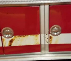 Blistered paint can be seen on the fire truck, which also had melted tires and pump panel damage.