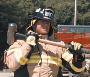 JJ Watt pays a visit to his hometown fire department. (Photo/YouTube screengrab)