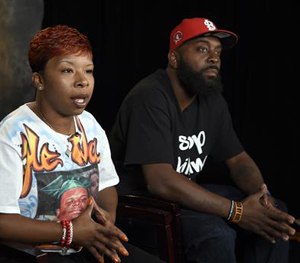 The parents of Michael Brown, Lesley McSpadden, left, and Michael Brown, Sr., right, sit for an interview with The Associated Press in Washington. (AP Image)
