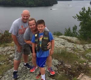 Officer Matthews with his wife and son. (Photo/Hennepin County Sheriff’s Office)