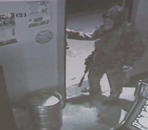 This dude was loaded for bear, staged an almost meaningless armed robbery and was almost certainly headed for his car/cover to prepare for the arrival of the cavalry.