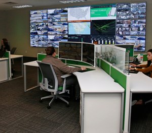 Paycom personnel monitor physical and IT security in the command center at the Oklahoma City Paycom campus Monday, Nov. 25, 2019, in Oklahoma City.