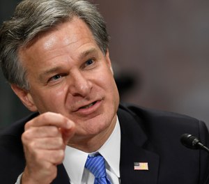 In this July 23, 2019 file photo, FBI Director Christopher Wray testifies before the Senate Judiciary Committee on Capitol Hill in Washington.