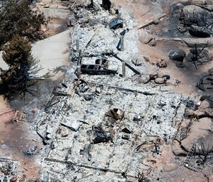 This aerial photo shows Yarnell, Ariz. on Wednesday, July 3, 2013, in the aftermath of the Yarnell Hill Fire that claimed the lives of 19 members of an elite firefighting crew.