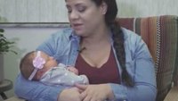Firefighters, paramedics fight back fire to save woman who just gave birth