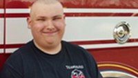 Photo: Jr. firefighter goes bald to honor firefighter brother's memory