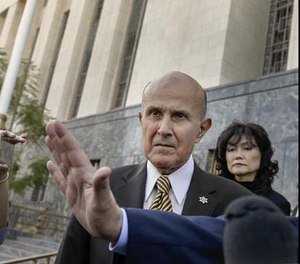 In this Feb. 10, 2016, file photo, former Los Angeles Sheriff Lee Baca leaves U.S. Court House building in Los Angeles on Wednesday, Feb. 10, 2016.