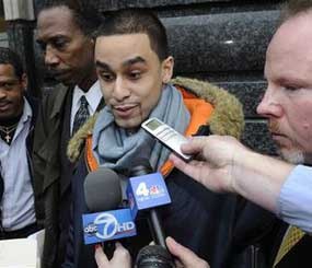 In this Dec. 9, 2008 file photo Michael Mineo, who says he was sodomized on Oct. 15, 2008 with a baton by a police officer in a Brooklyn subway station, speaks to the media outside Brooklyn state supreme court in New York.