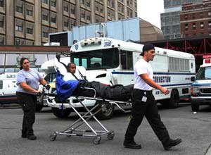 AP Photo
A patient is seen being evacuated from Bellevue Hospital in New York on Oct. 31. About 500 patients were evacuated in total due to storm damage.