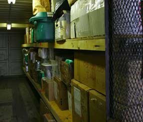 Boxes containing evidence sit in a storage facility at a police station.