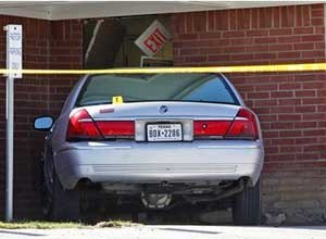 AP Photo/LM Otero
Forest Hill Police Chief Dan Dennis says the pastor of the church is dead after the driver of the car crashed into the building and began to assault him.
