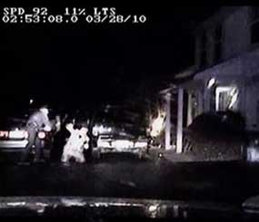 This file photo taken from video from a camera mounted on the dashboard of a squad car and provided Thursday, April 15, 2010 by the Cook County State's Attorney's office, shows a Streamwood, Ill., police officer allegedly beating a motorist.