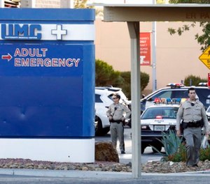 Las Vegas police work on the scene of an officer-involved shooting at University Medical Center on Monday, Sept. 25, 2017, in Las Vegas.