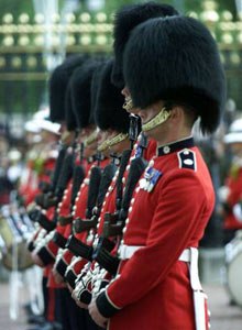 AP Photo/Max NashColdstream Guards stand at attention at Buckingham Palace on Sept. 13, 2001, during a special Changing of the Guard, ordered by Queen Elizabeth II in honor of the victims of the 9/11 terrorist attacks.