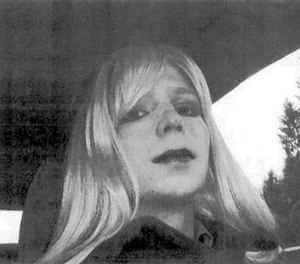 In this undated file photo provided by the U.S. Army Pfc. Chelsea Manning poses for a photo wearing a wig and lipstick. (AP File Photo/U.S. Army)