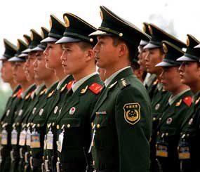 Officers line up for a public parade of the People's Armed Police of China at the 2008 Olympic games in Beijing, China.