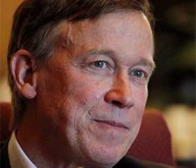 Colorado Gov. John Hickenlooper is pictured during an interview with the Associated Press at his office in the Capitol in Denver on Wednesday, Dec. 12, 2012. Colorado's governor says it's time the state considered gun control measures, almost five months after a movie theater massacre shocked the nation.