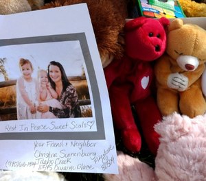In this Aug. 16, 2018, file photo, a photograph of Shanann Watts and her daughters, Bella, 4, left, and Celeste, 3, is shown at a makeshift memorial in Frederick, Colo. (AP Photo/David Zalubowski, file)