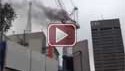 Giant crane catches fire atop university