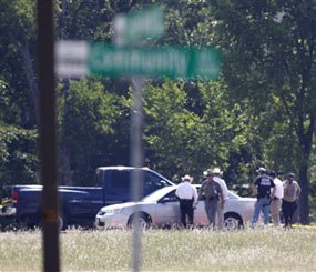 McKinney police block off the campus of Collin College after an active shooter incident outside the nearby McKinney Public Safety Building. (AP Photo)