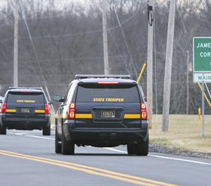 More State Troopers arrive on scene as all Delaware prisons went on lockdown late Wednesday due to a hostage situation unfolding Wednesday, Feb. 1, 2017, at the James T. Vaughn Correctional Center in Smyrna, Del. (Suchat Pederson/The Wilmington News-Journal via AP)