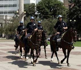 Denver Mounted Police patrol Civic Center Park in downtown Denver.