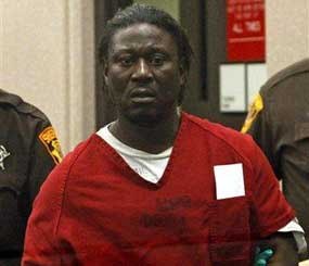 Milwuakee County Sheriff deputies lead into Walter E. Ellis for a court appearance in Milwaukee. During what police say was a 20-year killing spree in Milwaukee, Walter Ellis left his DNA behind all along the way but authorities did not have it on file. (AP Photo)