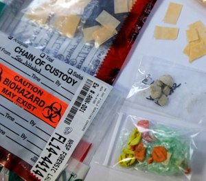 In this Tuesday, Feb. 21, 2017 photo, a selection of confiscated contraband drugs, which were found after smuggling attempts, are displayed at the New Hampshire State Prison in Concord, N.H.