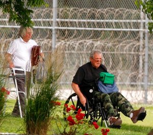 In this June 22, 2016, file photo, former Speaker of the House Dennis Hastert, right, reports to the Federal Medical Center in Rochester, Minn., to begin serving a sentence in a hush money case.