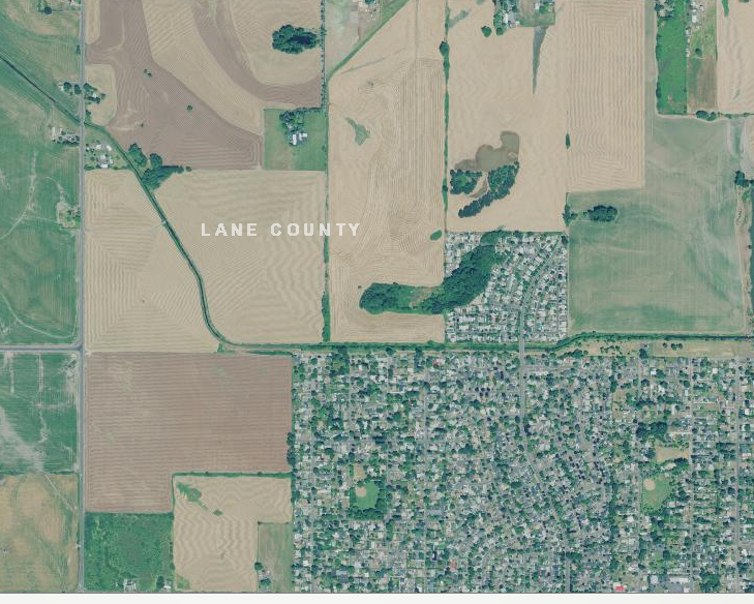 Eugene, Oregon’s urban growth boundary has protected land just outside city limits from development, but single-family residential land constitutes 87% of residential land inside the boundary. Image:Oregon Imagery Explorer, http://imagery.oregonexplorer.info/