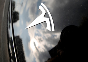This file photo shows the Tesla logo.