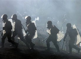 Endurance training in full riot gear (AP photo)