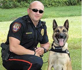Former Officer Scottie Greene and his K-9 Partner Rio