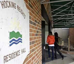 Students enter Hocking Heights residence hall at Hocking College Wednesday, Jan. 27, 2010, in Nelsonville, Ohio.