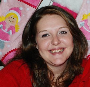 This 2009 photo provided by the Hunt family shows Kari Hunt Dunn. Hunt’s 9-year-old daughter tried to call 911 from the hotel room where she could hear her mother dying but didn’t know to dial 9 first. Hunt's slaying in December, allegedly at the hands of her estranged husband, inspired her father, Hank Hunt, to launch a national push to require hotels and other businesses to do away with dialing 9 or anything else before calling 911. (Image A/Courtesy of the Hunt family)