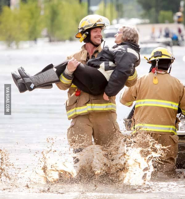 fireman carrying old lady