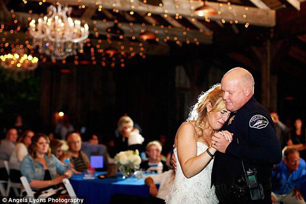 heartbreaking police photos. officers share father daughter wedding dance for fallen officer