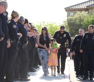 Hundreds of officers show up at a little girl's graduation days after her father was killed in the line of duty. The blue family will be there for one another come hell or high water.