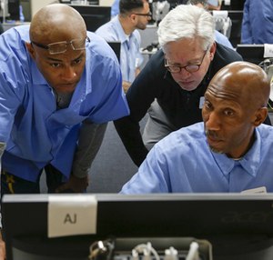 San Quentin inmates demonstrate their coding skills on graduation day in the Last Mile Works classroom on March 23, 2017 in San Quentin, Calif.