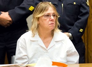 Joyce Mitchell, a former prison employee who provided the tools that two murderers used to cut their way out of a maximum-security facility in northern New York, listens intently to Judge Kevin Ryan during a restitution hearing at the Clinton County Government Center, Friday, Nov. 6, 2015, in Plattsburgh, N.Y.