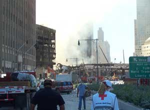 Image Kelly CloseThe author is seen at Ground Zero with two responders on September 12, 2001