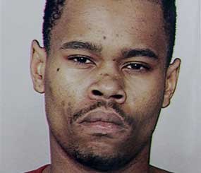 This undated file photo provided by the San Francisco Police shows Kenneth Harding, who died Saturday in a shootout with police. Investigators are now saying that the gunshot that killed Harding was self-inflicted