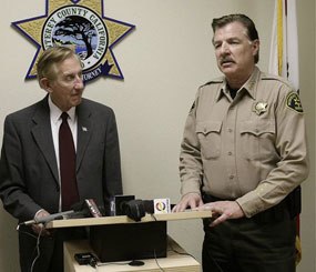 Monterey County District attorney Dean Flippo, left, and Monterey County Sheriff Scott Miller answer questions during a news conference, Tuesday, Feb. 25, 2014, in Salinas, Calif.