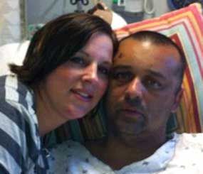 Alexandria Police Officer Peter Laboy and his wife