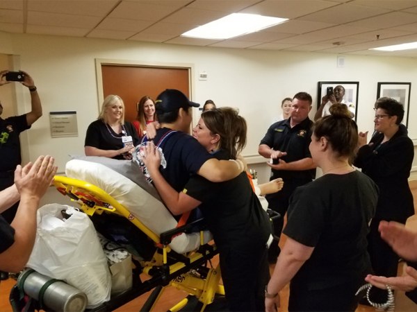 An leaving the hospital. (Photo/Dallas Fire-Rescue via Twitter)