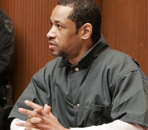 In this Friday, April 28, 2006 file photo, convicted sniper John Allen Muhammad addresses Judge James L. Ryan during a media preview before the start of his trial in Rockville, Md.
