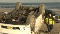 Injured driver kicks EMT after crash on beach